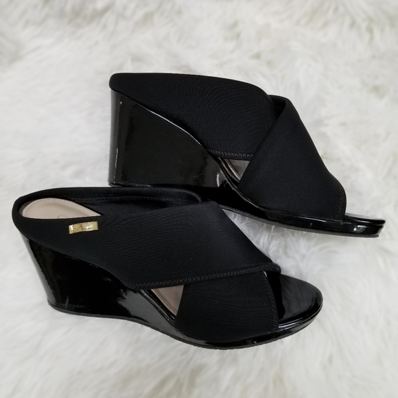 Calvin Klein Shoes - Calvin Klein Black Wedge Sandals